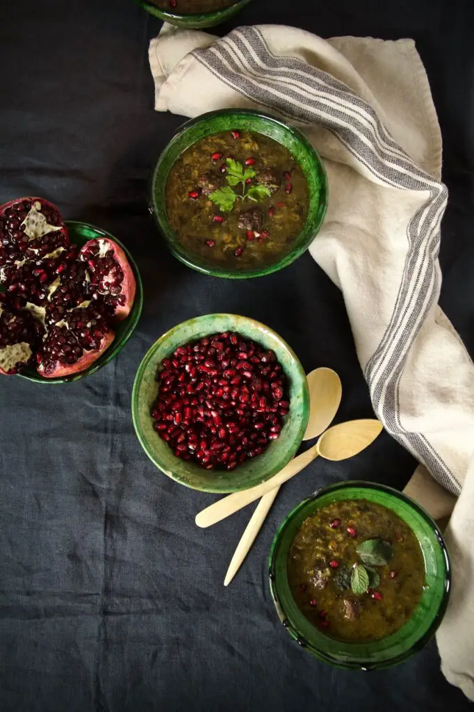 Ash-e Anar ba Koofteh Ghelgheli – Thick Pomegranate Soup with Meatballs and Mint Oil آش انار