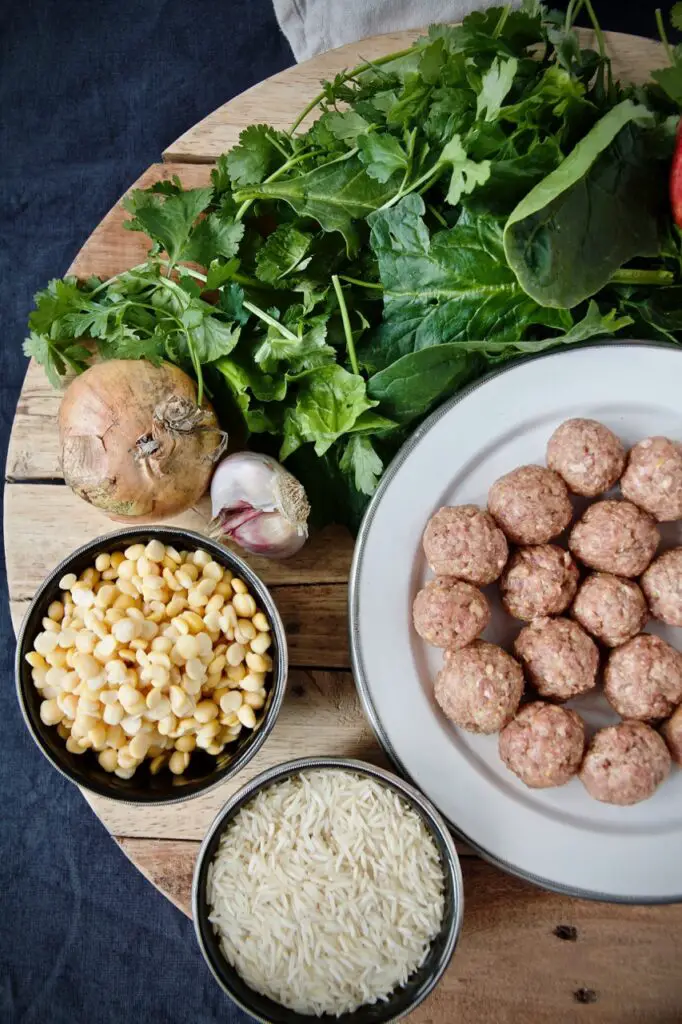 Ash-e Anar ba Koofteh Ghelgheli – Thick Pomegranate Soup with Meatballs and Mint Oil آش انار